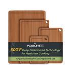 Four carbonized bamboo cutting boards with juice grooves and built-in handles