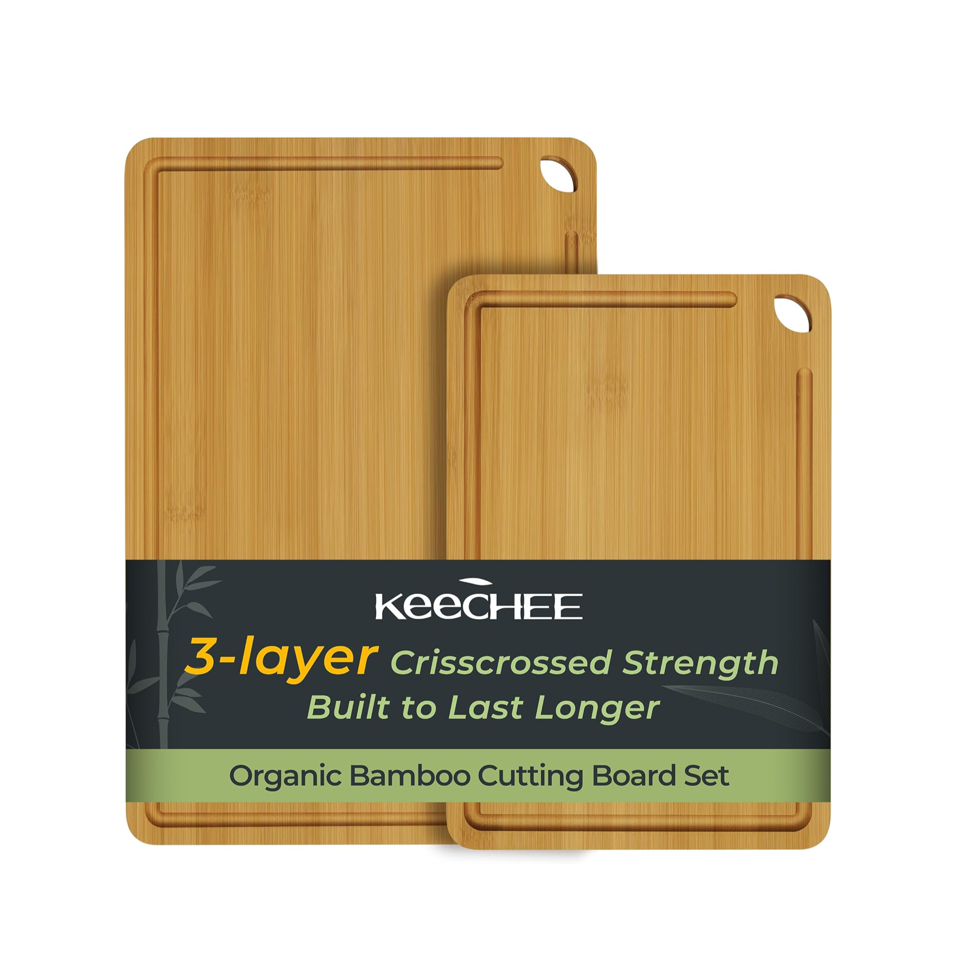 Two natural bamboo cutting boards with built-in handles and juice grooves