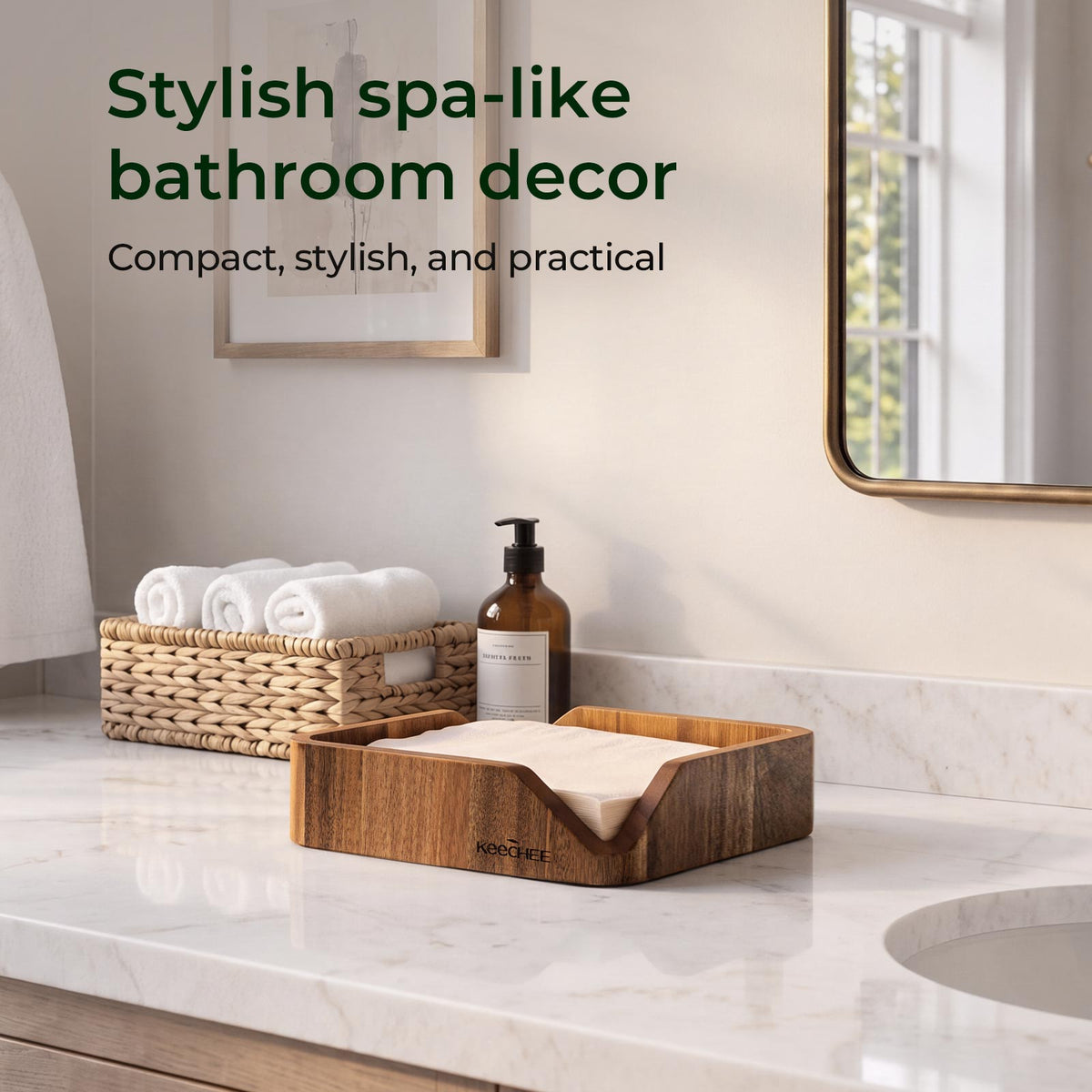 Wooden napkin holder with folded paper napkins on a bathroom counter beside soap and rolled towels